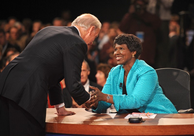 PBS journalist and debate moderator Gwen Ifill and then-Democratic vice presidential nominee, Sen. Joe Biden, (D-DE), left, shake hands at the end of his vice presidential debate with Republican rival, Alaska Gov. Sarah Palin in St. Louis, Mo. in 2008. CREDIT: AP Photo/Don Emmert