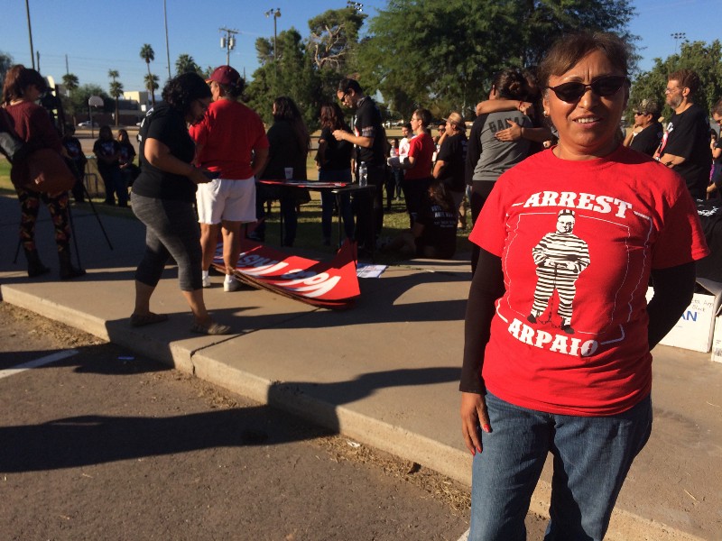 Maricruz Ramirez prepares to canvas West Phoenix. CREDIT: Alice Ollstein