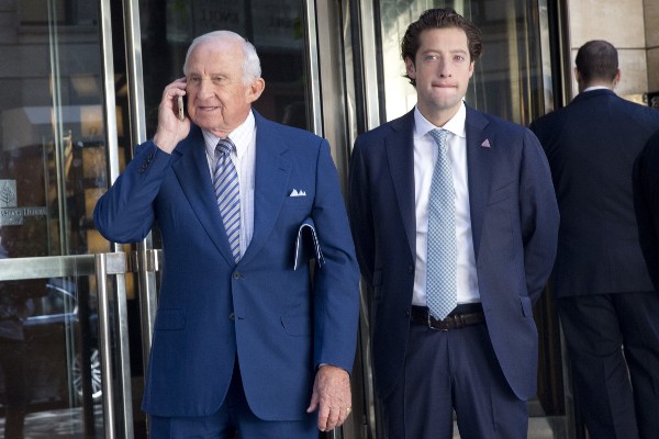 Mel Sembler, left, leaves the Four Seasons hotel after a GOP fundraiser, Thursday, June 9, 2016, in New York. CREDIT: AP Photo/Mary Altaffer)