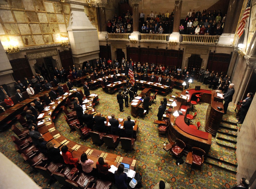Members of New York’s Electoral College meet in the New York state Senate Chamber in Albany, N.Y., to elect President Barack Obama and Vice President Joseph Biden on Monday, Dec. 17, 2012. Members of the Electoral College cast the official, final votes in the 2012 presidential election. CREDIT: AP Photo/Tim Roske