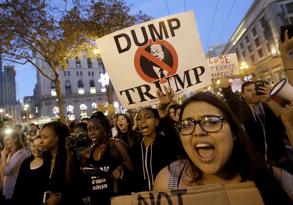 Protesters march in opposition of Donald Trump’s presidential election victory, Wednesday, Nov. 9, 2016, in San Francisco. CREDIT: AP Photo/Jeff Chiu