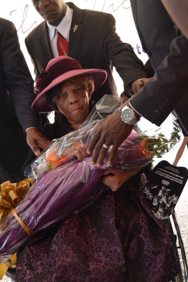 Victor accepts a bouquet of flowers. CREDIT: Kira Lerner