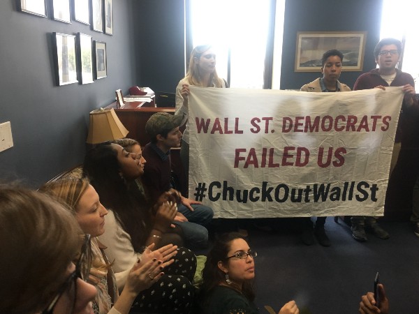 Protesters inside Schumer’s office. CREDIT: Kira Lerner
