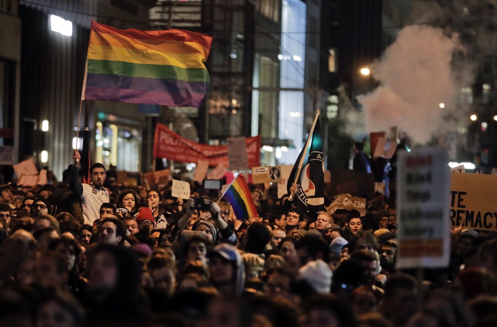 A protest outside Trump Tower the night after the election. CREDIT: AP Photo/Julie Jacobson