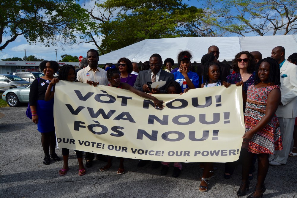 Haitian-American North Miami residents march from their church to the local polling place. CREDIT: Kira Lerner