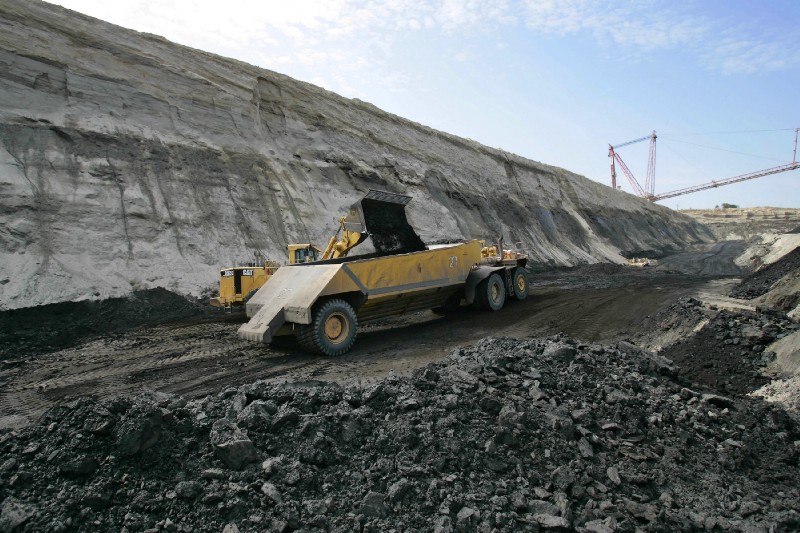 Texas and coal are shaping up to be powerful forces in the Trump administration. Here, coal is loaded into a truck near Fairfield, Texas. The mine provides coal for the neighboring TXU Corp’s power plant. CREDIT: AP Photo/David J. Phillip