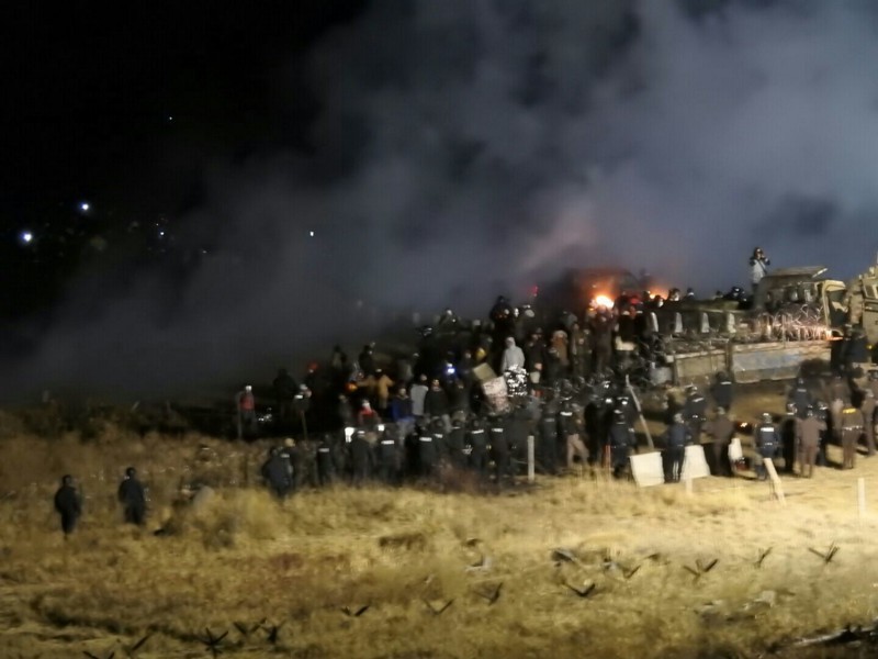 Law enforcement and protesters clash near the site of the Dakota Access pipeline on Nov. 20, 2016. CREDIT: Morton County Sheriff’s Department via AP