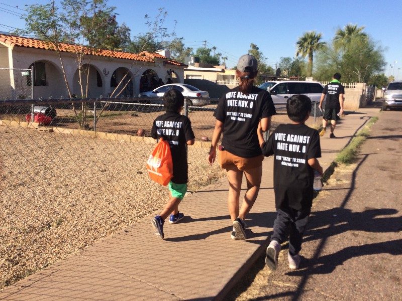 A mother and her two sons hit the streets of West Phoenix with the Bazta Arpaio campaign. CREDIT: Alice Ollstein