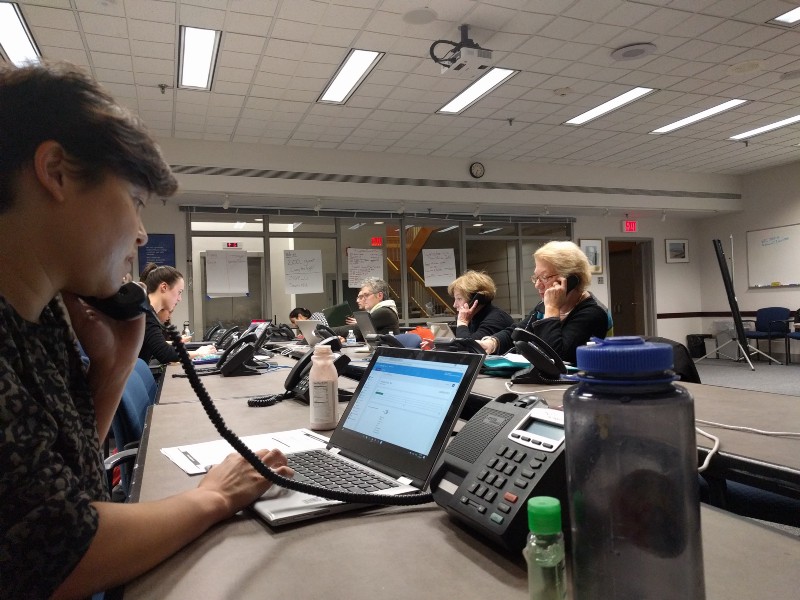 Phone bankers reach out to recently naturalized U.S. citizens, many of whom will be voting in their first American election on Tuesday. CREDIT: Alan Pyke/ThinkProgress