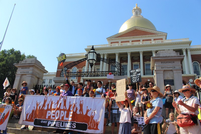 Protesting pipelines outside of the Massachusetts Statehouse. CREDIT: Better Future Project/350 Mass Action