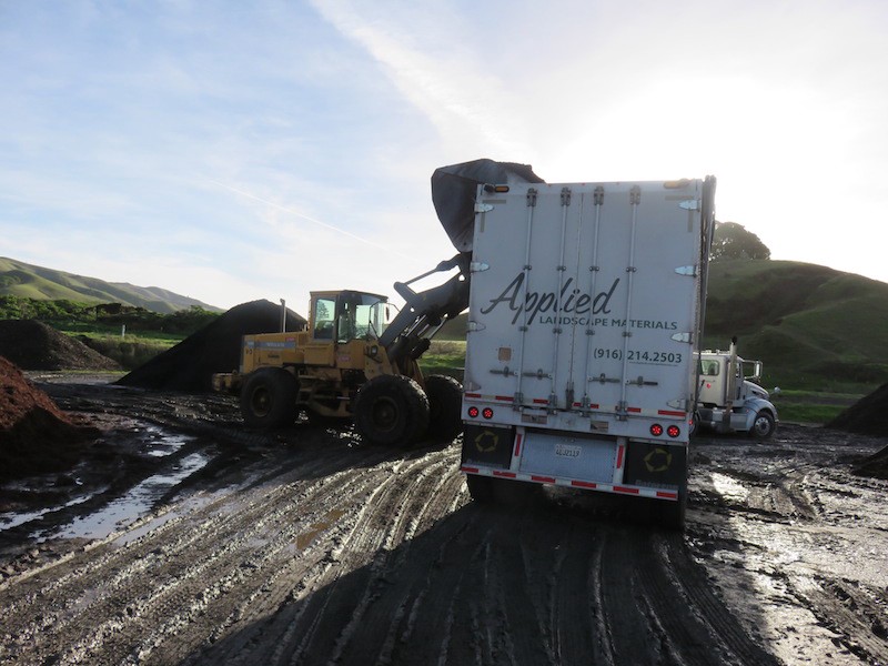 Loading compost at the West Marin Compost facility in Nicasio, Calif. CREDIT: Robyn Purchia