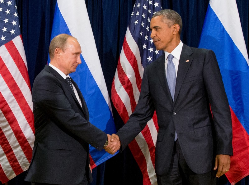 President Barack Obama shakes hands with Russian President President Vladimir Putin before a bilateral meeting at United Nations headquarters. CREDIT: AP Photo/Andrew Harnik