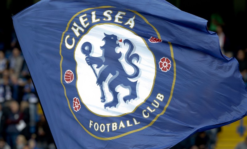 The Chelsea football club flag is waved on the pitich prior to the start to of the English Premier League soccer match between Chelsea and Leicester City, at Stamford Bridge stadium in London, Saturday, Oct. 15, 2016. CREDIT: AP Photo/Alastair Grant