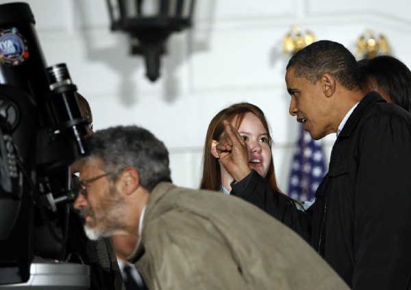 Holdren with Obama and Caroline Moore on the South Lawn in 2009. CREDIT: AP Photo/Pablo Martinez Monsivais