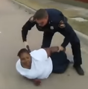 Officer Martin of the Fort Worth Police Department arresting Jacqueline Craig. CREDIT: YouTube/Screengrab