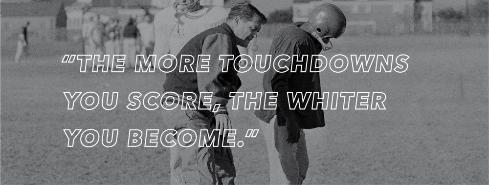 LeVias (right) with SMU head coach Hayden Fry. Credit: AP Photo