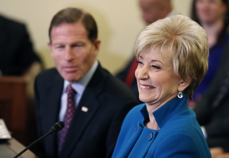 Small Business Administration Administrator-designate, former wrestling entertainment executive, Linda McMahon, accompanied by Sen. Richard Blumenthal, D-Conn., laughs on Capitol Hill in Washington, Tuesday, Jan. 24, 2017, while testifying at her confirmation hearing before the Senate Small Business and Entrepreneurship Committee. CREDIT: AP Photo/Alex Brandon