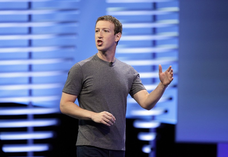 Facebook CEO Mark Zuckerberg delivers the keynote address at the F8 Facebook Developer Conference in San Francisco. CREDIT: AP Photo/Eric Risberg, File