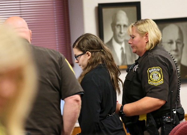 Morgan E. Geyser, left, and Anissa Weier, right, are escorted into and out of a Waukesha County Court on Nov. 11,2016 and Sept. 9 2016, respectively, in Waukesha, Wis. CREDIT: Michael Sears/Milwaukee Journal-Sentinel via AP, Pool
