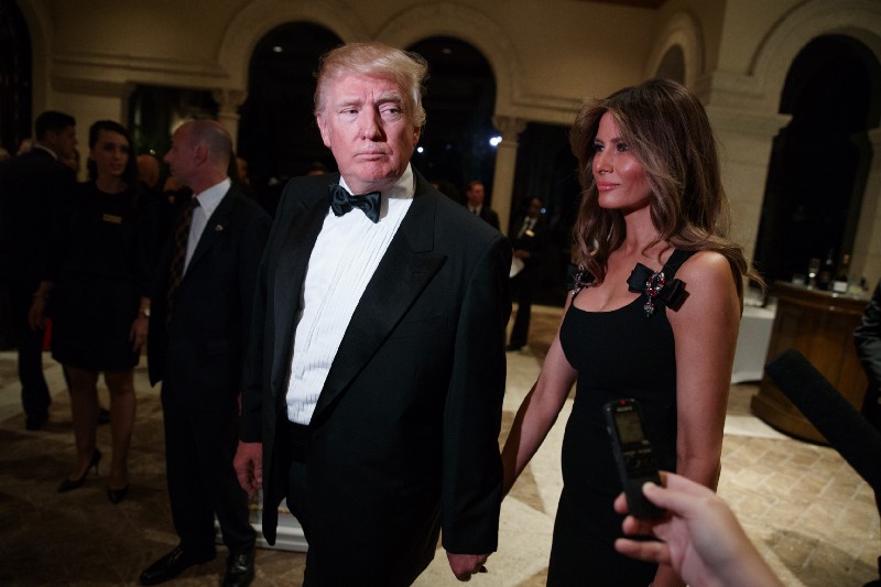 President-elect Donald Trump (R) and his wife Melania. CREDIT: AP Photo/Evan Vucci