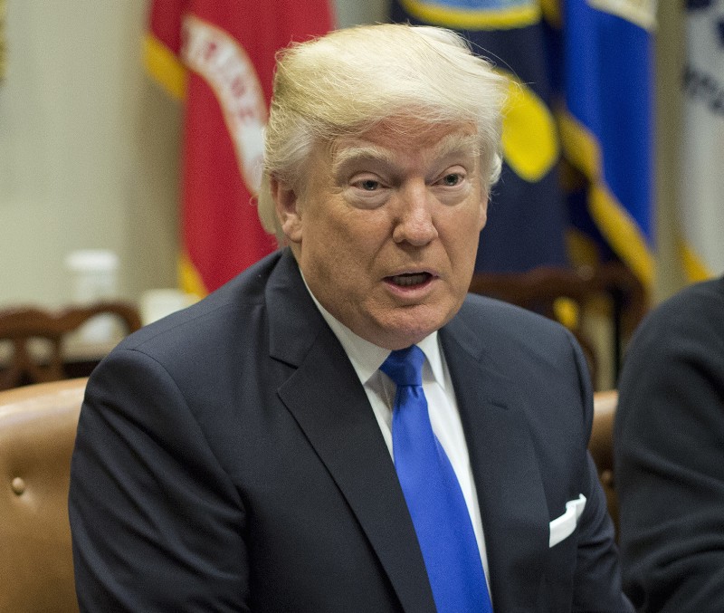 President Donald Trump speaks during his meeting with automobile leaders in the Roosevelt Room of the White House in Washington, January 2,4 2017. CREDIT: AP Photo/Pablo Martinez Monsivais, File