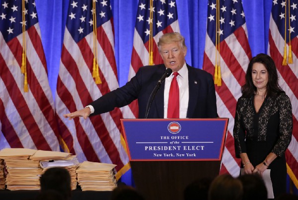 President-elect Donald Trump speaks as one of his attorneys listens during a news conference, Wednesday, Jan. 11, 2017 CREDIT: AP Photo/Seth Wenig