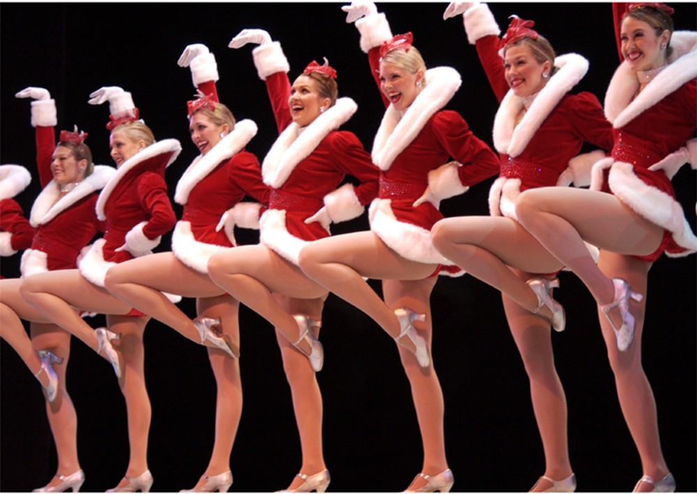 Members of the Radio City Rockettes wear their Christmas costumes Wednesday, April 14, 2004, at The Wang Theatre in Boston. CREDIT: AP Photo/Josh Reynolds