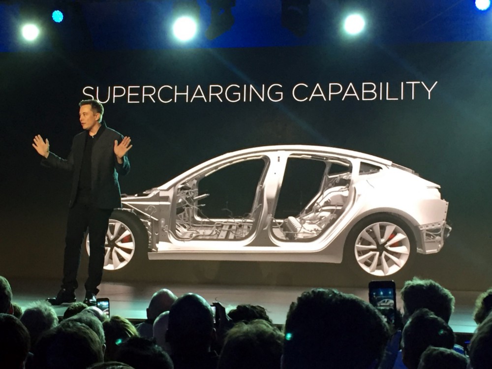 Tesla Motors CEO Elon Musk speaks at unveiling of the affordable, long-range Model 3, which saw a record-smashing 400,000 pre-sales. CREDIT: AP/Justin Pritchard