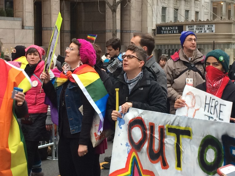 Mike McVicker-Weaver holds a banner reading “Out of the closet, into the streets.” CREDIT: Alice Ollstein