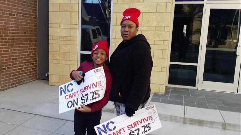 Cromer and her son protested the minimum wage in North Carolina. CREDIT: Johaunna Cromer