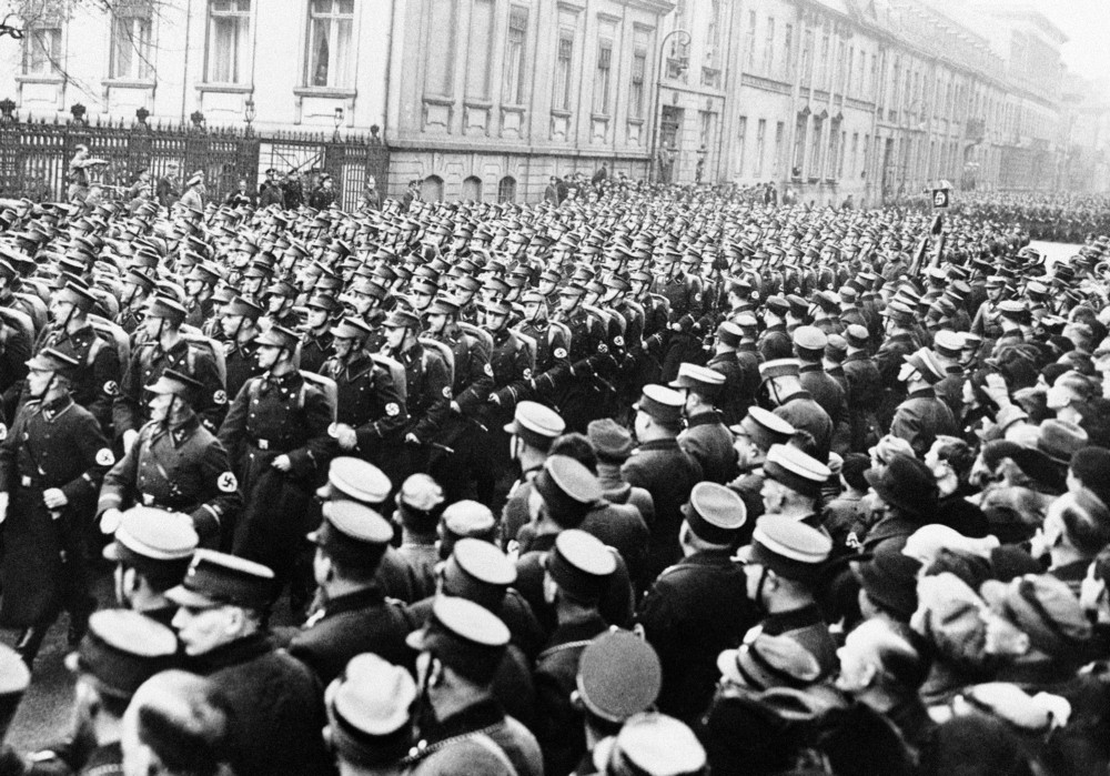 The big parade of the Berlin S.A. before the Kanzler in the Wilheimstrasse, Berlin, on New Year’s Day 1935. CREDIT: AP Photo