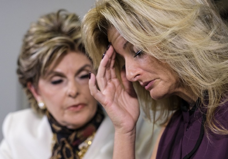 Summer Zervos sharing her story at a press conference in October. CREDIT: AP Photo/Ringo H.W. Chiu