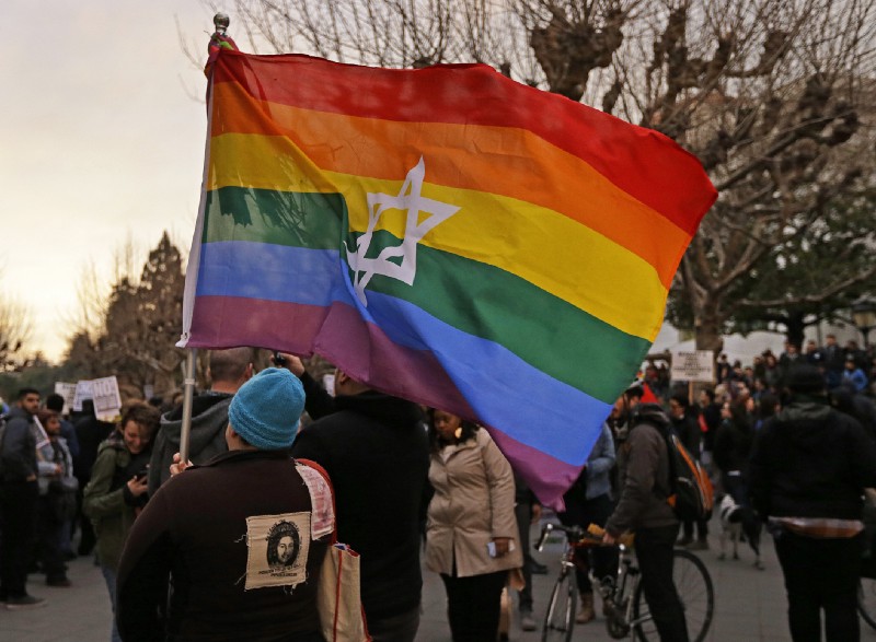 People protest the appearance of Milo Yiannopoulos Wednesday, Feb. 1, 2017, in Berkeley, Calif. CREDIT: AP Photo/Ben Margot