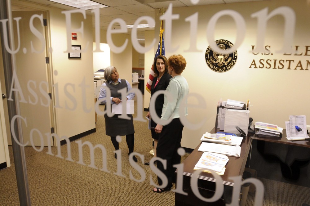U.S Election Assistance Commissioners Rosemary Rodriguez, left, Caroline Hunter, center, and Donetta Davidson, right, meet at the E.A.C. offices May 15, 2008 in Washington. CREDIT: AP Photo/William B. Plowman