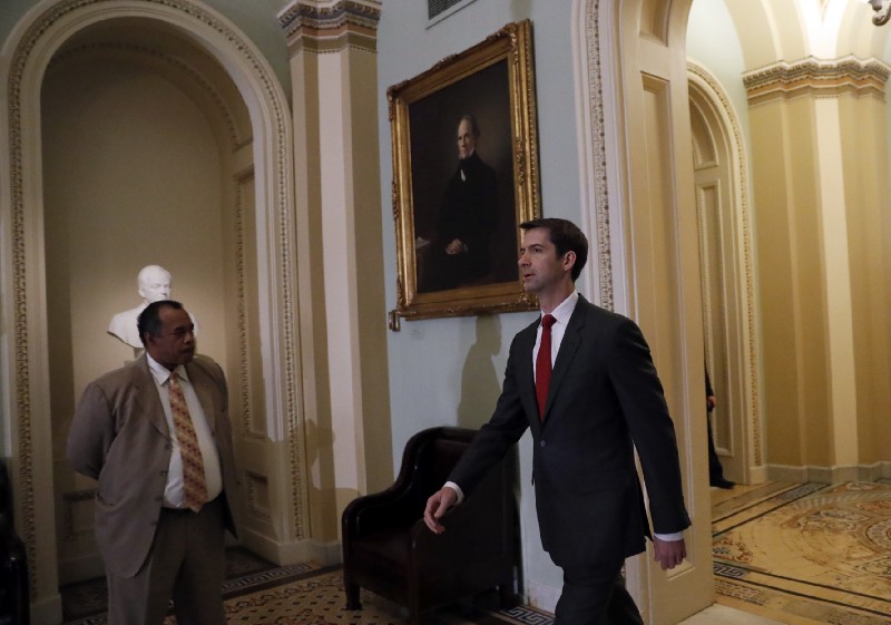 Sen. Tom Cotton (R-AR) on the right. CREDIT: AP Photo/Alex Brandon