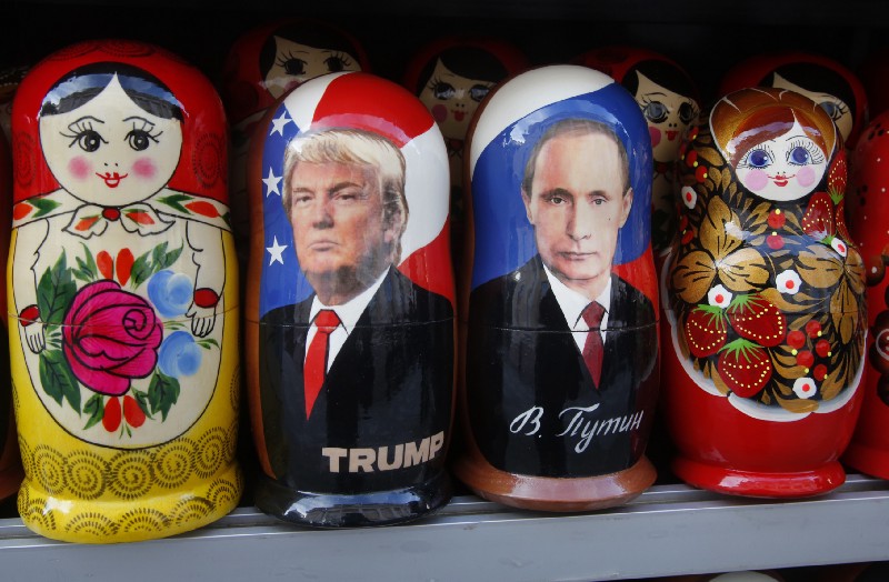 Traditional Russian wooden dolls called Matryoshka depicting Russian President Vladimir Putin and Donald Trump, hours before Donald Trump is to be sworn in as president of the United States, are displayed for sale at a street souvenir shop in St. Petersburg, Russia, Friday, Jan. 20, 2017. CREDIT: AP Photo/Dmitri Lovetsky