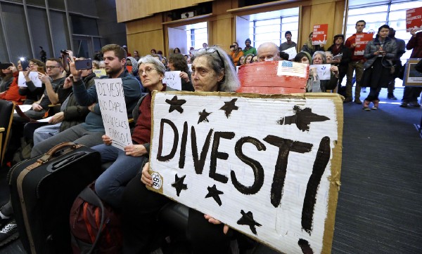 The audience at the City Council meeting February 7. CREDIT: AP Photo/Elaine Thompson