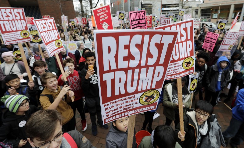 Inauguration Day protests in Seattle. CREDIT: AP Photo/Elaine Thompson