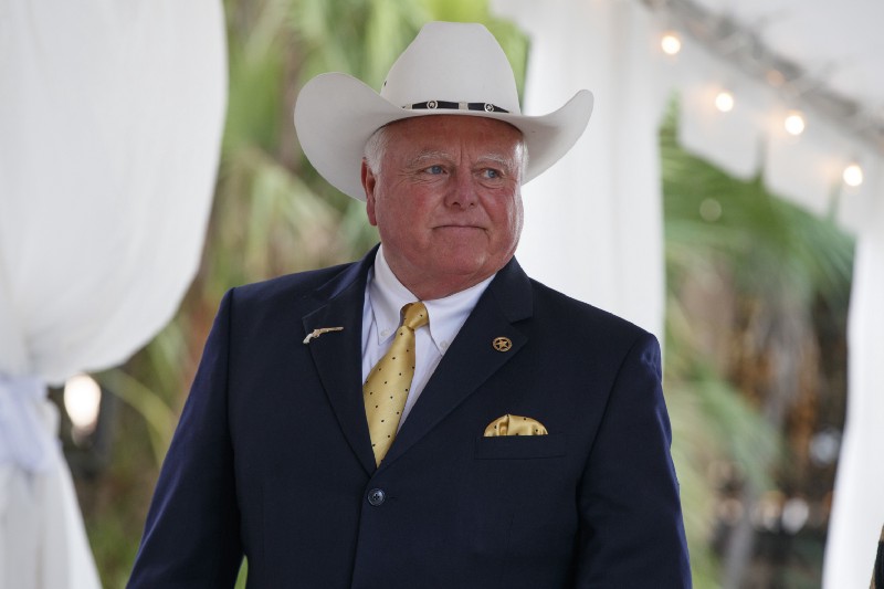 Texas Agriculture Commissioner Sid Miller, a Trump ally, helped circulate a false story blaming border-crossers for a shootout between hunters in January. CREDIT: AP Photo/Evan Vucci