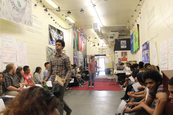 Community members gather at the UPROSE office. CREDIT: UPROSE