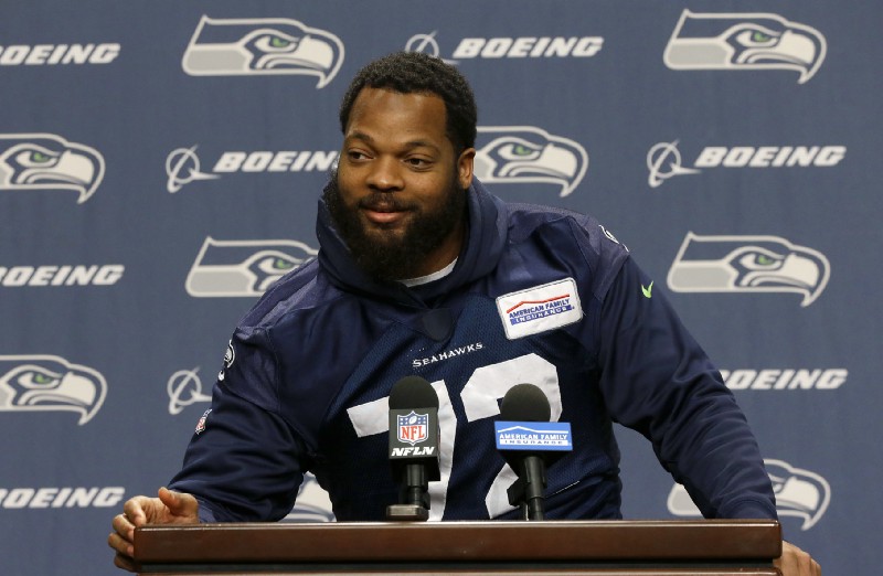 Seattle Seahawks defensive end Michael Bennett talks to reporters, Tuesday, Jan. 10, 2017, in Renton, Wash. The Seahawks play the Atlanta Falcons in an NFC divisional playoff NFL football game, Saturday, Jan. 14, 2017 in Atlanta CREDIT: AP Photo/Ted S. Warren