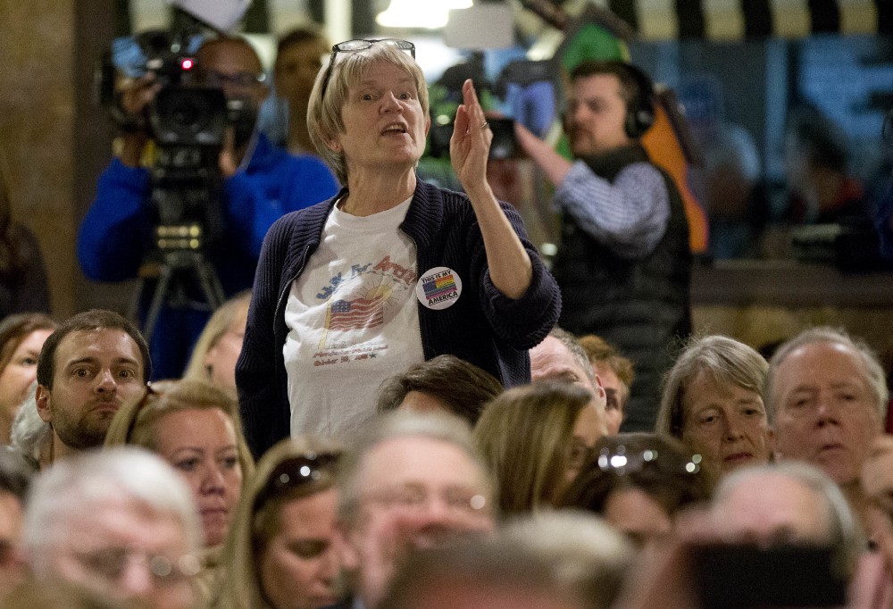 A constituent of congressman Dave Brat, R-Va., gestures as she responded to the congressman during a town hall meeting with the congressman in Blackstone, Va., Tuesday, Feb. 21, 2017. Brat held a town hall after intense criticism this week, but many other lawmakers are ducking the open forums. CREDIT: AP Photo/Steve Helber