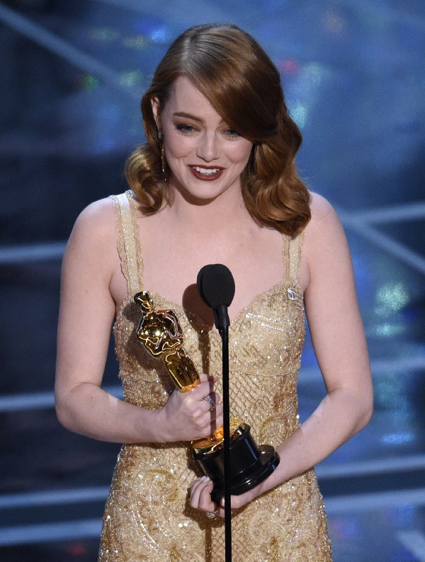 Emma Stone accepts the award for best actress in a leading role for “La La Land” at the Oscars on Sunday, Feb. 26, 2017. CREDIT: Chris Pizzello/Invision/AP