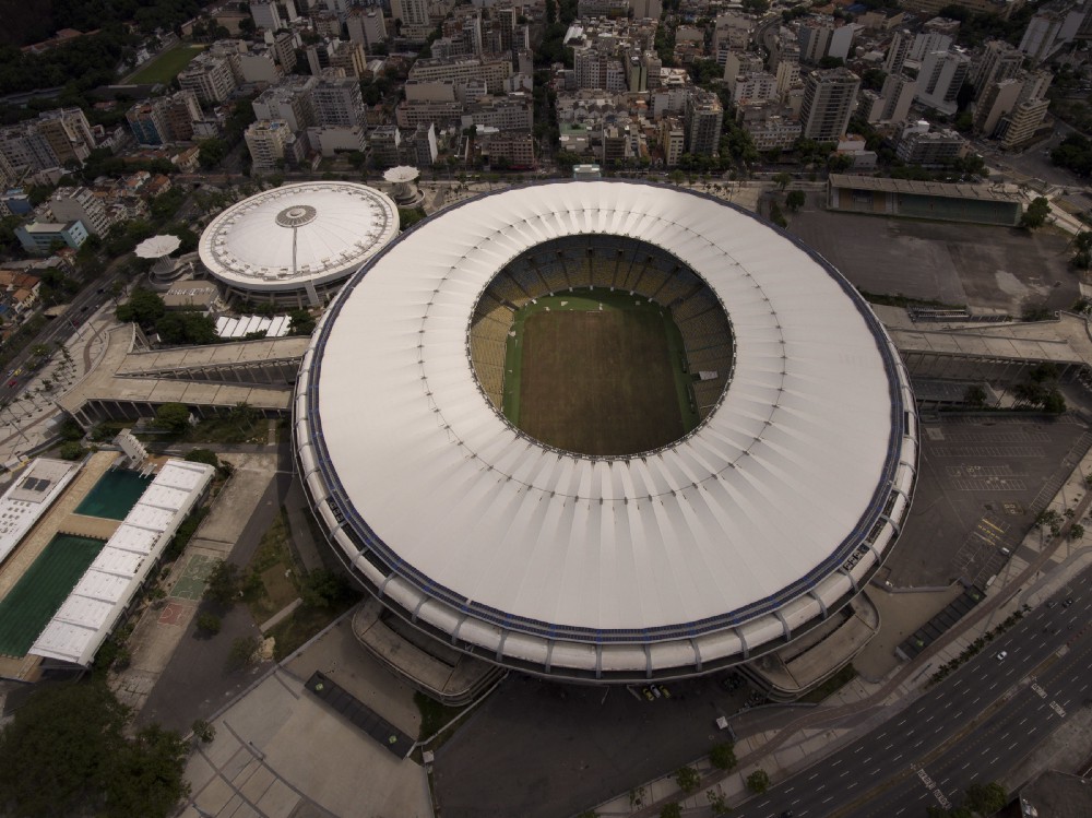 This Feb. 2, 2017 shows Maracana stadium with a dry field in Rio de Janeiro, Brazil. Stadium operators, the Rio state government, and Olympic organizers have fought over $1 million in unpaid electricity bills and management of the venue. CREDIT: AP Photo/Silvia Izquierdo