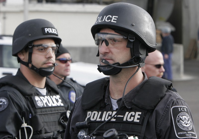 Immigration and Custom Enforcement police CREDIT: AP Photo/Ed Andrieski
