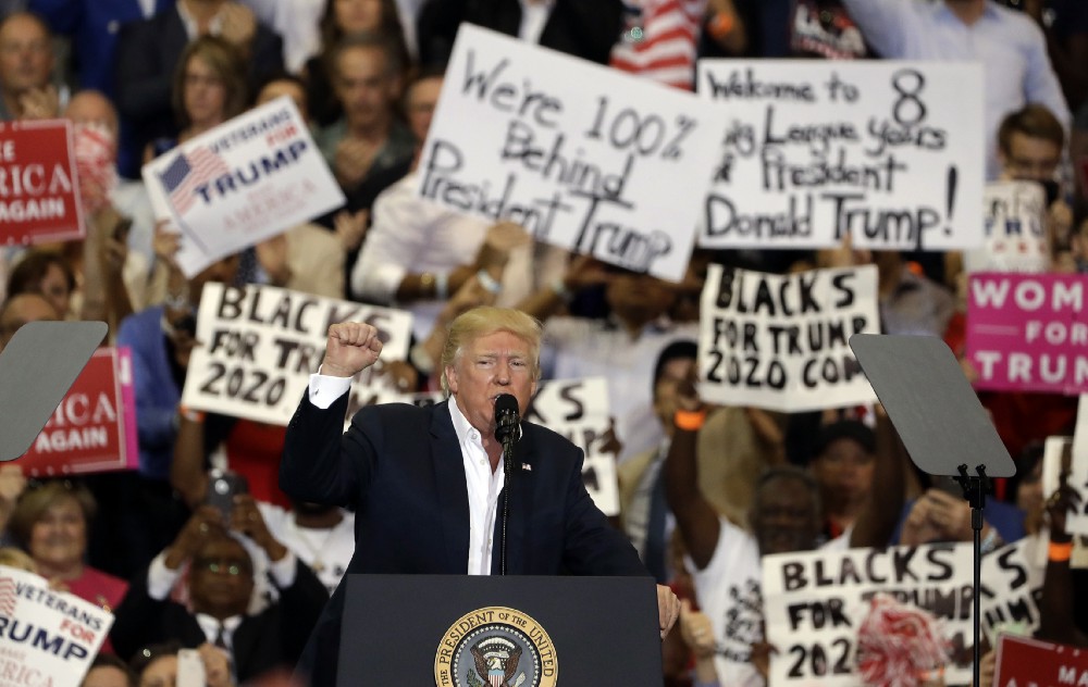 President Donald Trump pumps his fist to supporters at the conclusion of a campaign rally Saturday, Feb. 18, 2017, in Melbourne, Fla. CREDIT: AP Photo/Chris O’Meara
