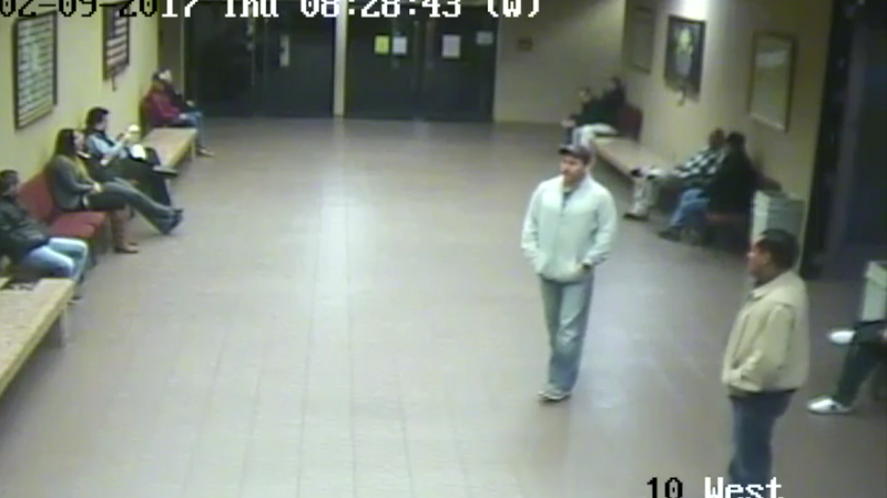 Two ICE agents arrive on the 10th floor of the courthouse, where family court CREDIT: Screenshot via El Paso County