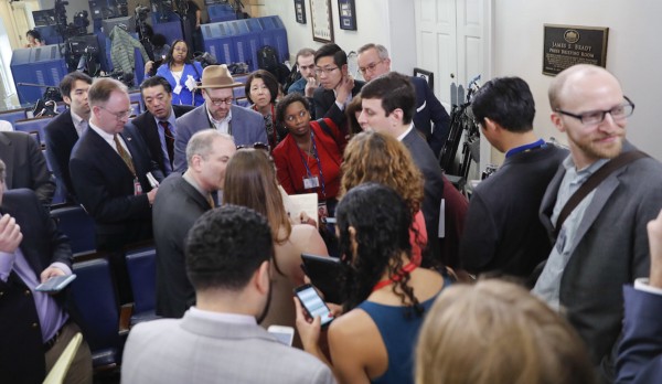 Chaos from inside the White House briefing room on Friday. Credit: AP Photo