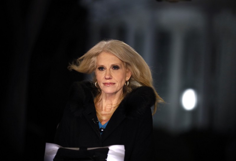 Counselor to President Donald Trump Kellyanne Conway pauses as she speaks during a television interview with the White House in the background, in Washington, Thursday, Feb. 9, 2017. CREDIT: Carolyn Kaster