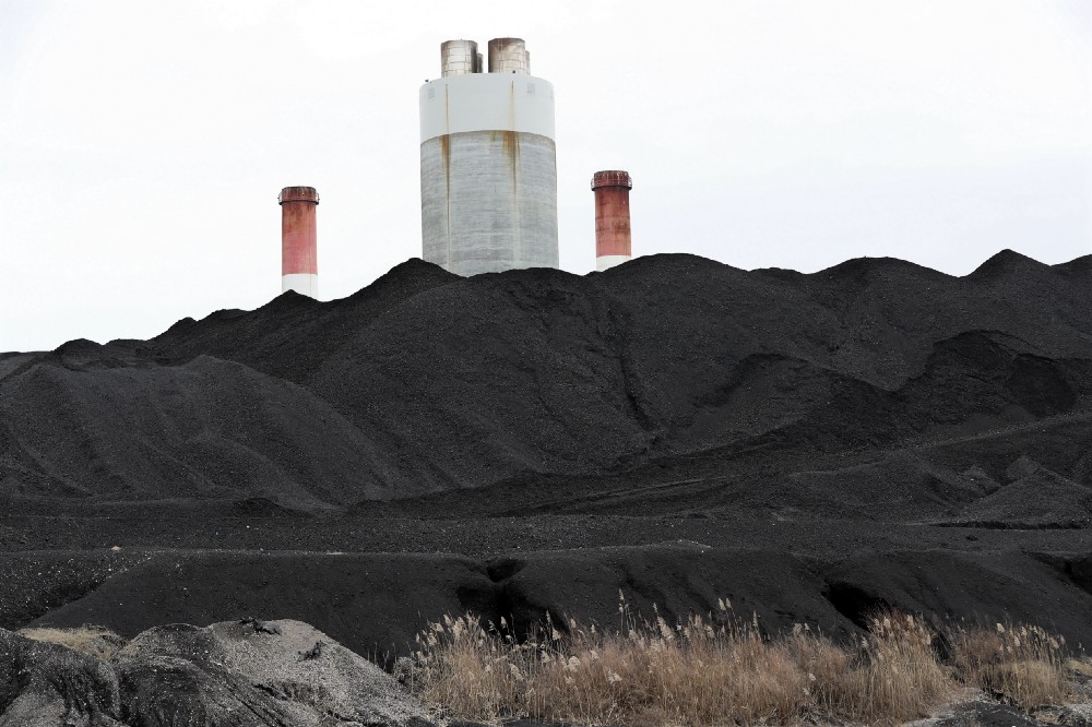 Coal piled at the Gallatin Fossil Plant in Gallatin, Tennessee. CREDIT: AP Photo/Mark Humphrey